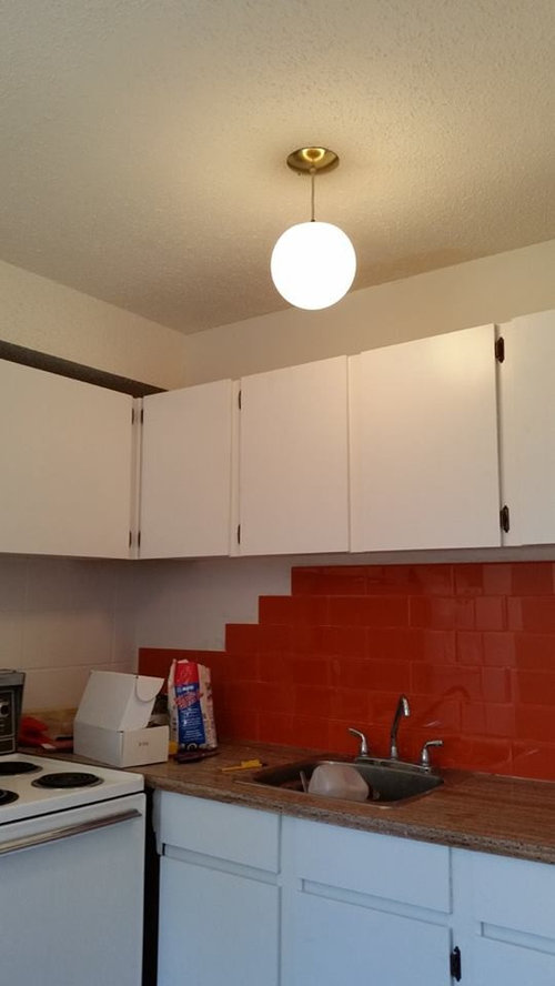 colours to go with orange glass tile backsplash?