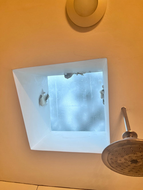 peeling paint near skylight. what’s the cause?