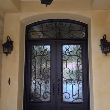 Entry Iron Door and Wall Sconces
