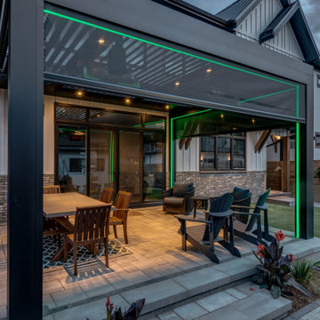 StruXure Adjustable Pergola with TRAX Lighting and Phantom Motorized Screens