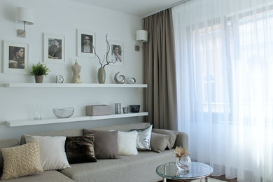 Living room - small modern open concept dark wood floor living room idea in Other with white walls and a tv stand