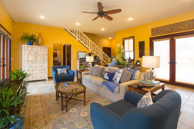 Large asian formal open concept living room in Hawaii with a wall-mounted tv, yellow walls and ceramic floors.