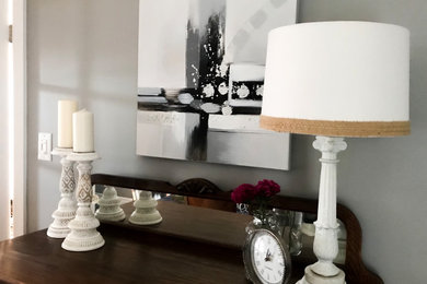 Inspiration for a rustic dark wood floor and brown floor dining room remodel in Toronto with gray walls