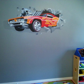 Four-year-old boy's bedroom ural of Hot Wheels car crashing through the wall.