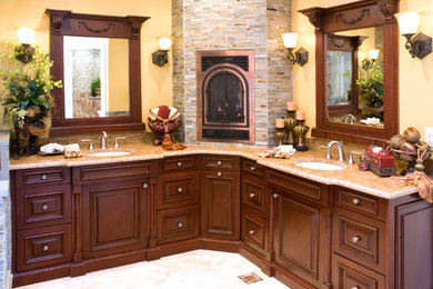 Bathroom - mid-sized traditional master subway tile and beige tile ceramic tile bathroom idea in New York with raised-panel cabinets, medium tone wood cabinets, yellow walls, a one-piece toilet and a console sink