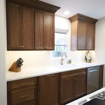 Rich & Refined: Custom Walnut Kitchen Remodel with White Quartz & Oak Flooring