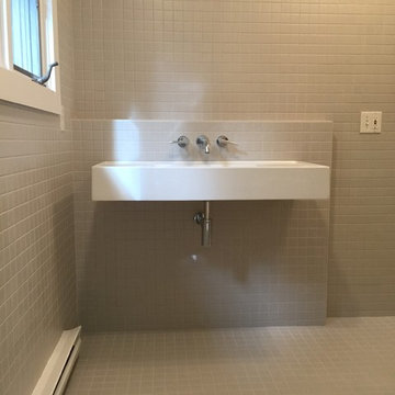 Custom tiled master bath with barrier free shower