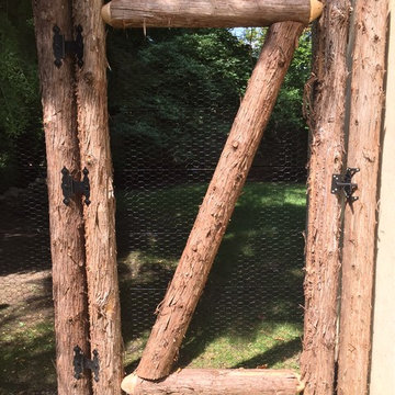 Steel Hex Web Deer Fence Gate with Bark-On Cedar Posts