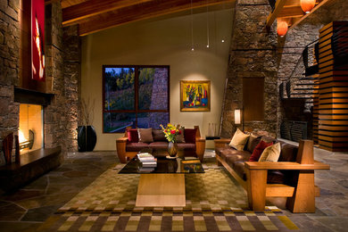 Huge minimalist open concept living room photo in Denver with beige walls and a brick fireplace