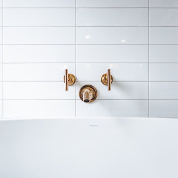 Bathroom remodeling in Arlington, VA with double vanity & corner bathtub