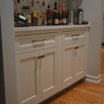 Chappaqua NY - Custom White & Navy Cabinets w/ Honey Bronze