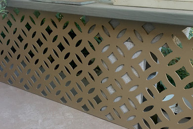 Example of a large tuscan patio design in Other
