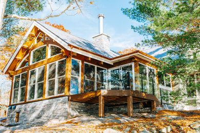 Example of a mountain style exterior home design in Toronto
