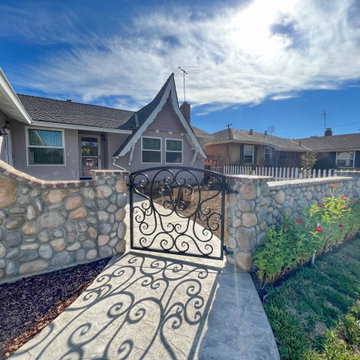 Front Yard Transformation (Cobblestone Fence, Grass, Idaho Quartzite Slabs)
