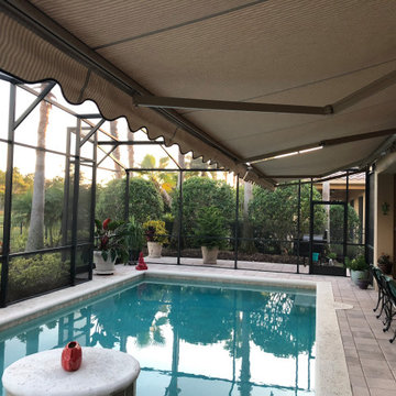 Palm Bay Screen room with awnings installed