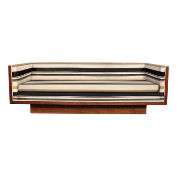 Sofa reupholstered in bold stripe fabric