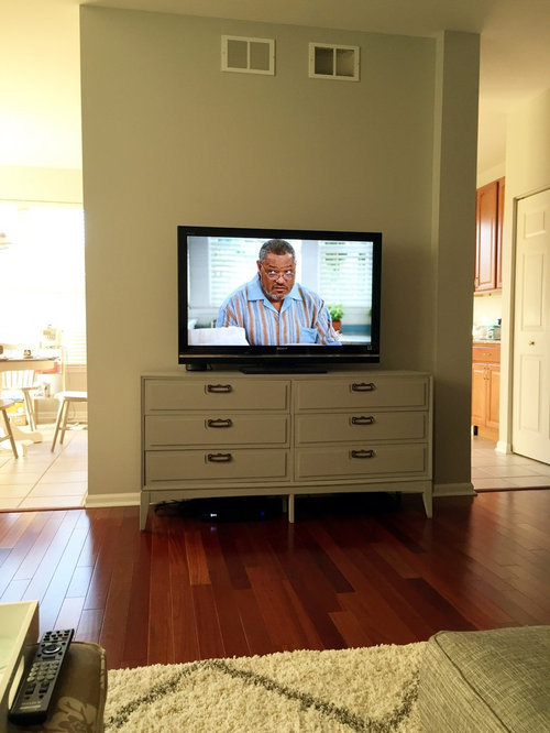 Sagging MCM Dressertv console.