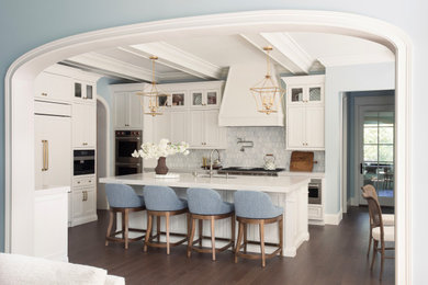 Eat-in kitchen - large transitional u-shaped dark wood floor and brown floor eat-in kitchen idea in St Louis with an undermount sink, beaded inset cabinets, white cabinets, quartz countertops, multicolored backsplash, mosaic tile backsplash, paneled appliances, an island and white countertops