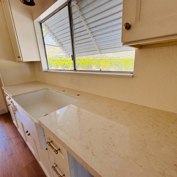 White Calcutta Luxiomer Quartz Install