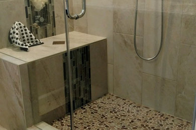 Example of a small trendy 3/4 beige tile and mosaic tile ceramic tile corner shower design in San Diego with flat-panel cabinets, dark wood cabinets, a two-piece toilet, beige walls and laminate countertops