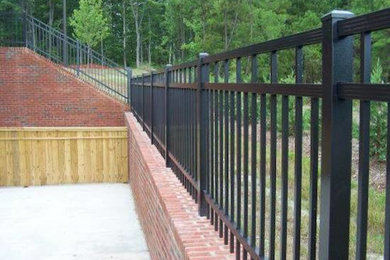 Backyard concrete patio container garden photo in Raleigh with no cover