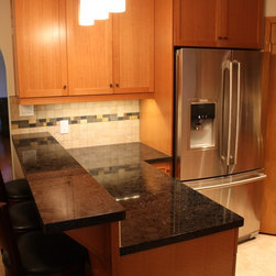 Warm and Inviting RIft Oak Spice - Kitchen Cabinetry