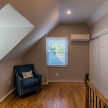 Dormer, recessed lighting and hardwood floors accent this small area.