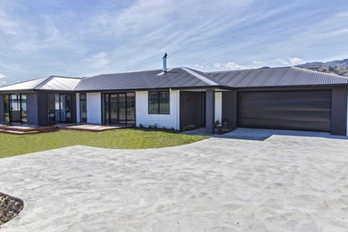 Example of an exterior home design in Other