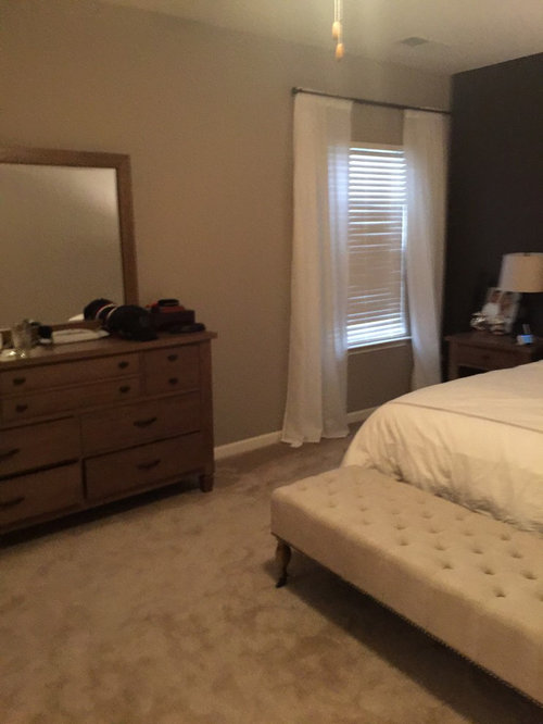 Big blank wall in bedroom