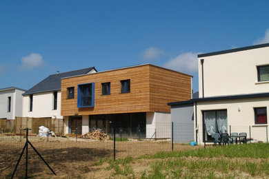 Aménagement d'une façade de maison moderne en bois.