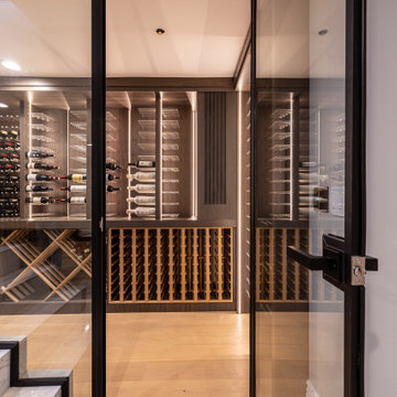 Custom Staircase Glass Wine Cellar & Display Cabinet in Newport Beach
