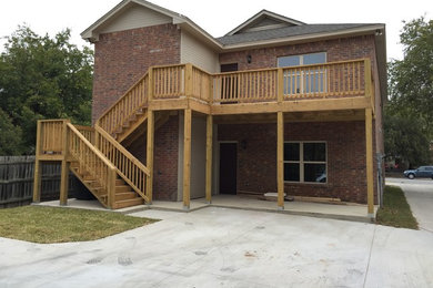 Inspiration for a mid-sized backyard deck remodel in Dallas with no cover