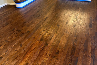 Inspiration for a small modern dark wood floor and brown floor kitchen/dining room combo remodel in New York