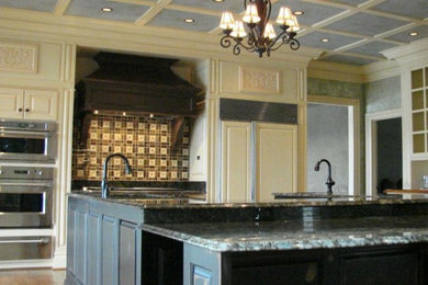 Medium tone wood floor open concept kitchen photo in Other with raised-panel cabinets, white cabinets, granite countertops, beige backsplash, stainless steel appliances and an island