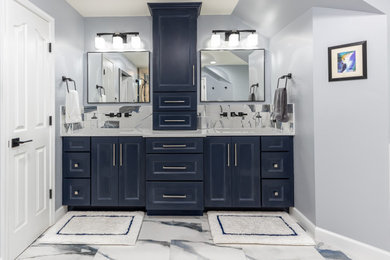 Bathroom remodeling in Columbia, MD with double vanity & marble bathtub