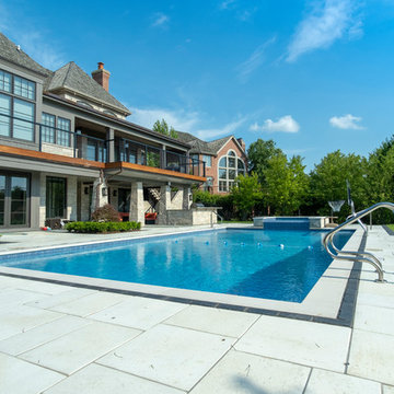 Burr Ridge Lap Pool with Raised Hot Tub and Waterfall