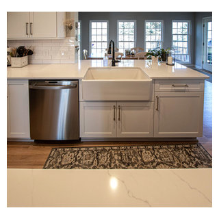 Siteline White Kitchen with Gray Island and Calacatta Miraggio Quartz ...