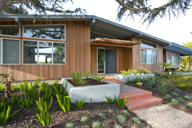 Mid-sized 1950s brown house exterior idea in Santa Barbara