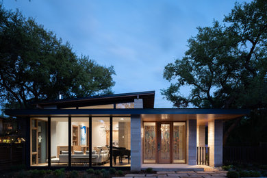 Example of a 1960s exterior home design in Austin