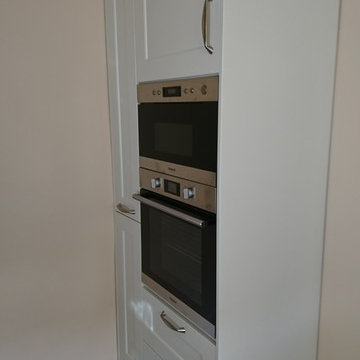 Clever use of a small space, pull out larder, oven and microwave