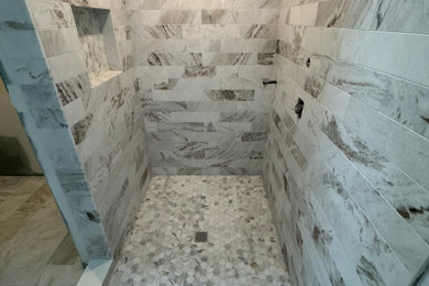 Marble tile on walls and shower floors