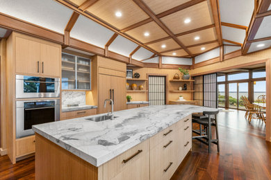 Inspiration for a large mid-century modern u-shaped medium tone wood floor, brown floor and vaulted ceiling enclosed kitchen remodel in New York with an undermount sink, flat-panel cabinets, light wood cabinets, quartzite countertops, quartz backsplash, paneled appliances, an island and gray countertops