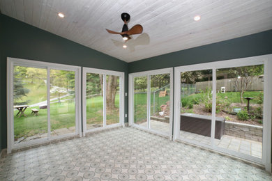 Example of a mid-sized transitional ceramic tile and multicolored floor sunroom design in Philadelphia