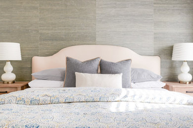 Mid-sized transitional guest carpeted and beige floor bedroom photo in Other with gray walls