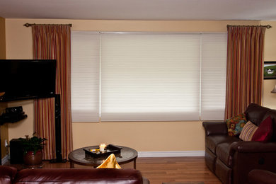 Hunter Douglas Duette shades & some beautiful side panels to complete the room.