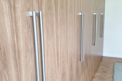 Photo of a traditional wardrobe in Sussex.