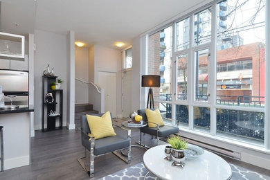 Example of a trendy living room design in Vancouver with beige walls