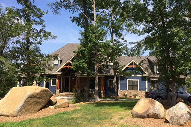 Large craftsman blue two-story mixed siding exterior home idea in Raleigh