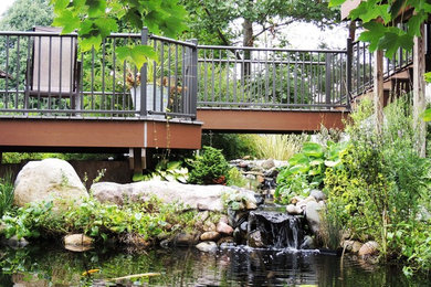 Backyard water fountain deck photo in Grand Rapids
