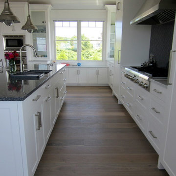 MONTAUK: WIDE PLANK ENGINEERED INSTALLED/WHITE OAK INSTALLED/FINISHED IN BEDRMS